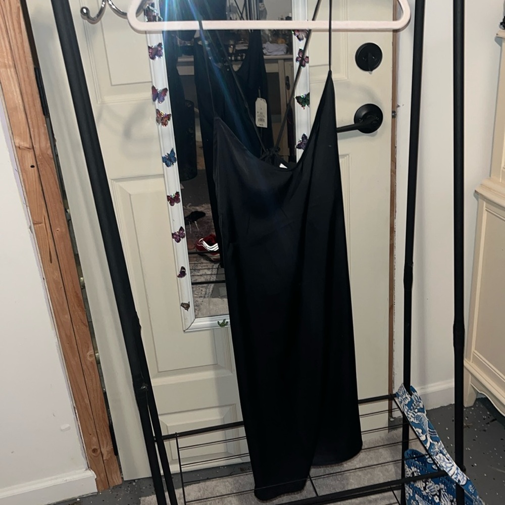 Star above silk small black dress